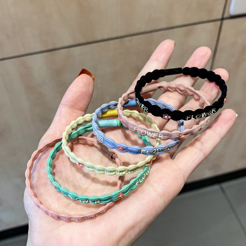 彈力繩花朵簡約髮圈－黑色款實拍｜https://igowo.tw/