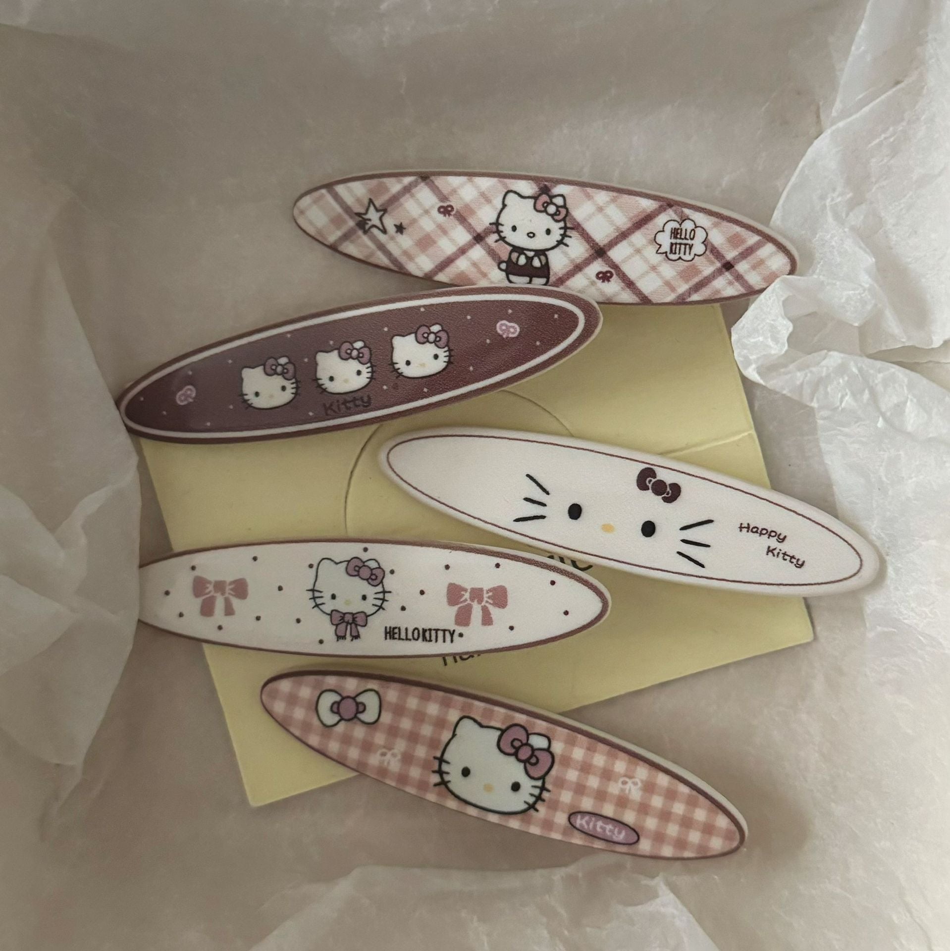 棕色貓咪橢圓髮夾－商品主圖｜https://igowo.tw/