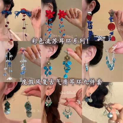 皮繩貝殼圓形流蘇耳環－商品主圖｜https://igowo.tw/