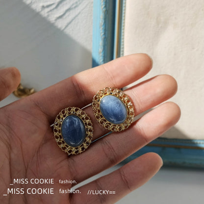 藍色銀針橢圓鏤空耳環－商品主圖｜https://igowo.tw/