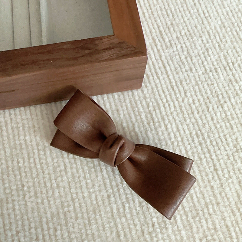 棕色蝴蝶結髮夾