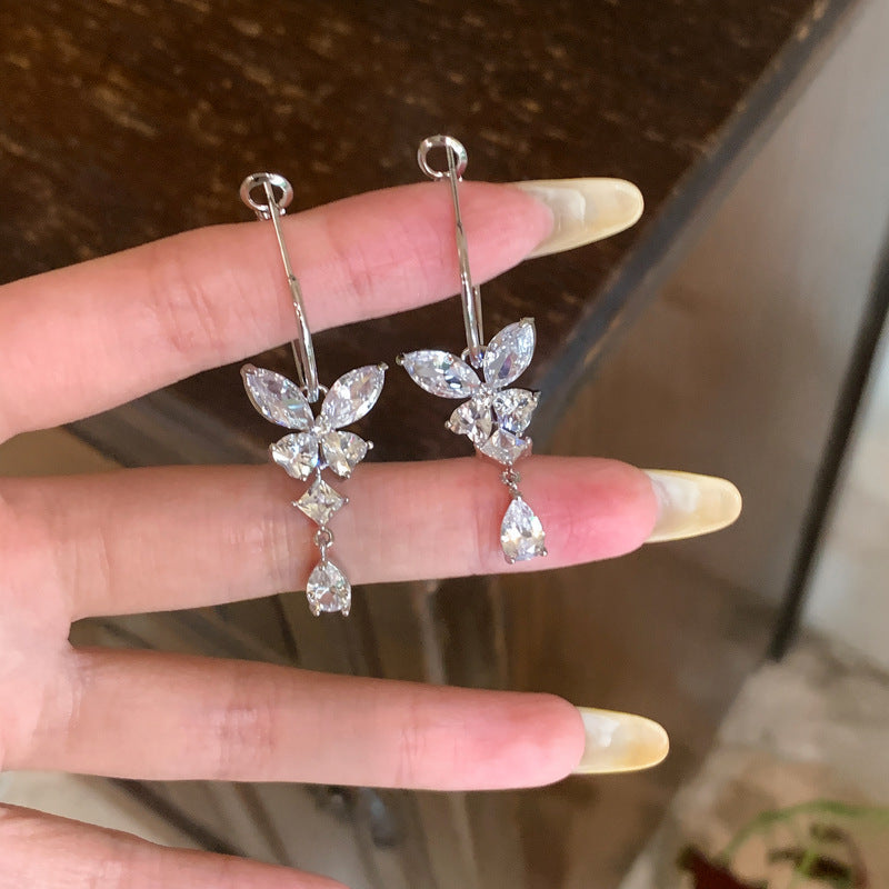 鋯石銀針蝴蝶流蘇耳釘－銀針-銀色款實拍｜https://igowo.tw/