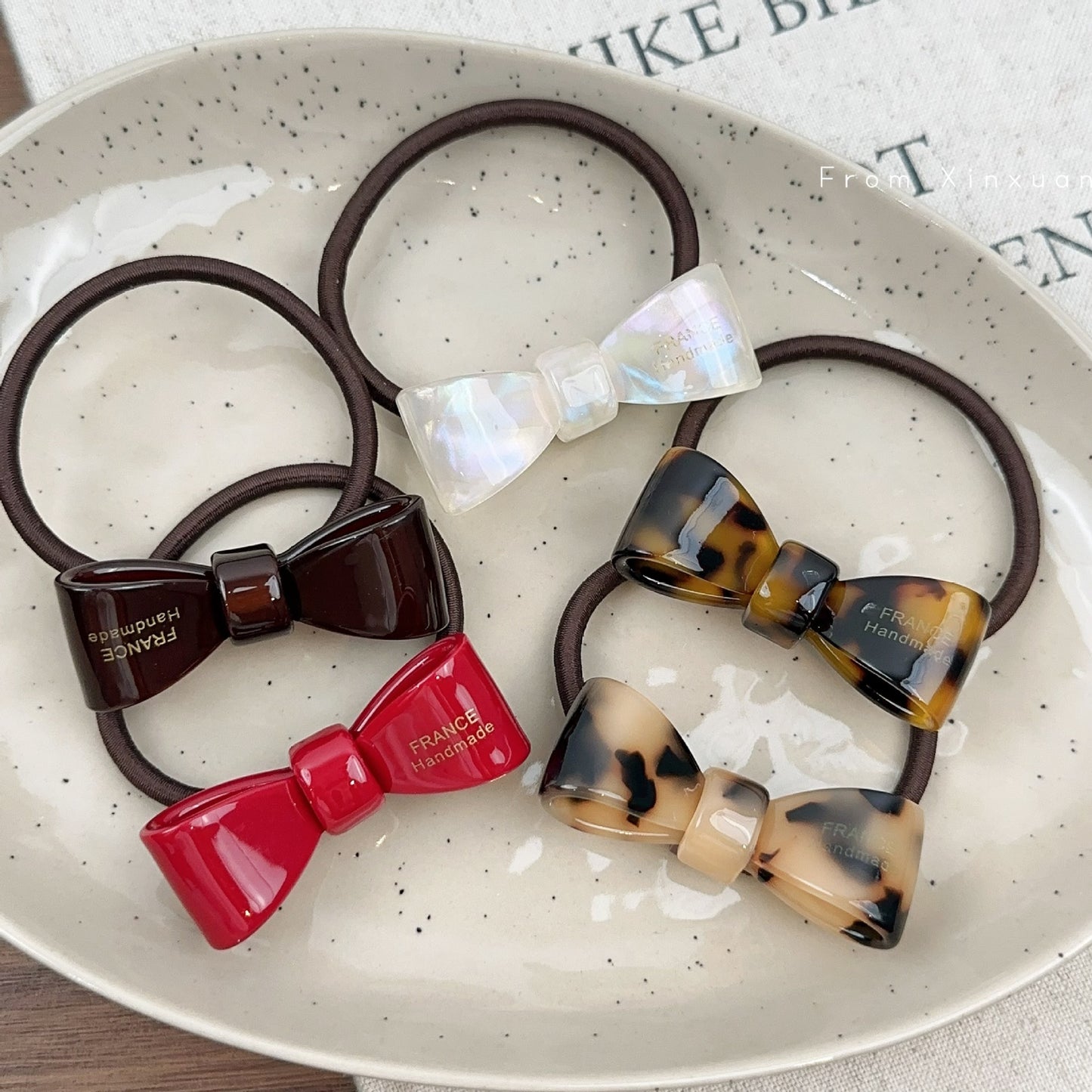 醋酸板材蝴蝶結髮圈－商品主圖｜https://igowo.tw/