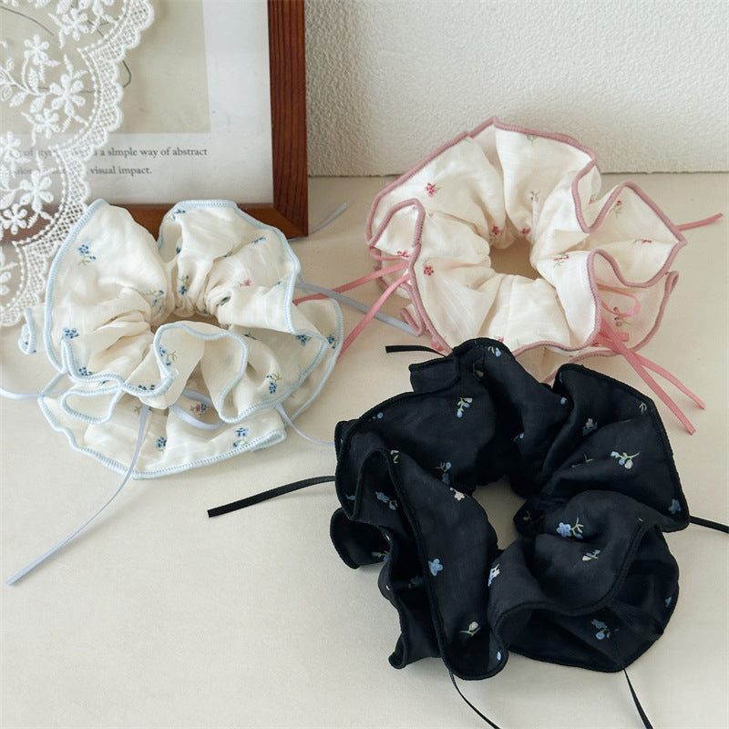 蝴蝶結碎花髮圈－商品主圖｜https://igowo.tw/