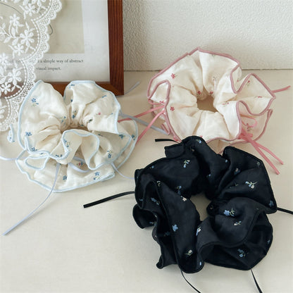 蝴蝶結碎花髮圈－商品主圖｜https://igowo.tw/