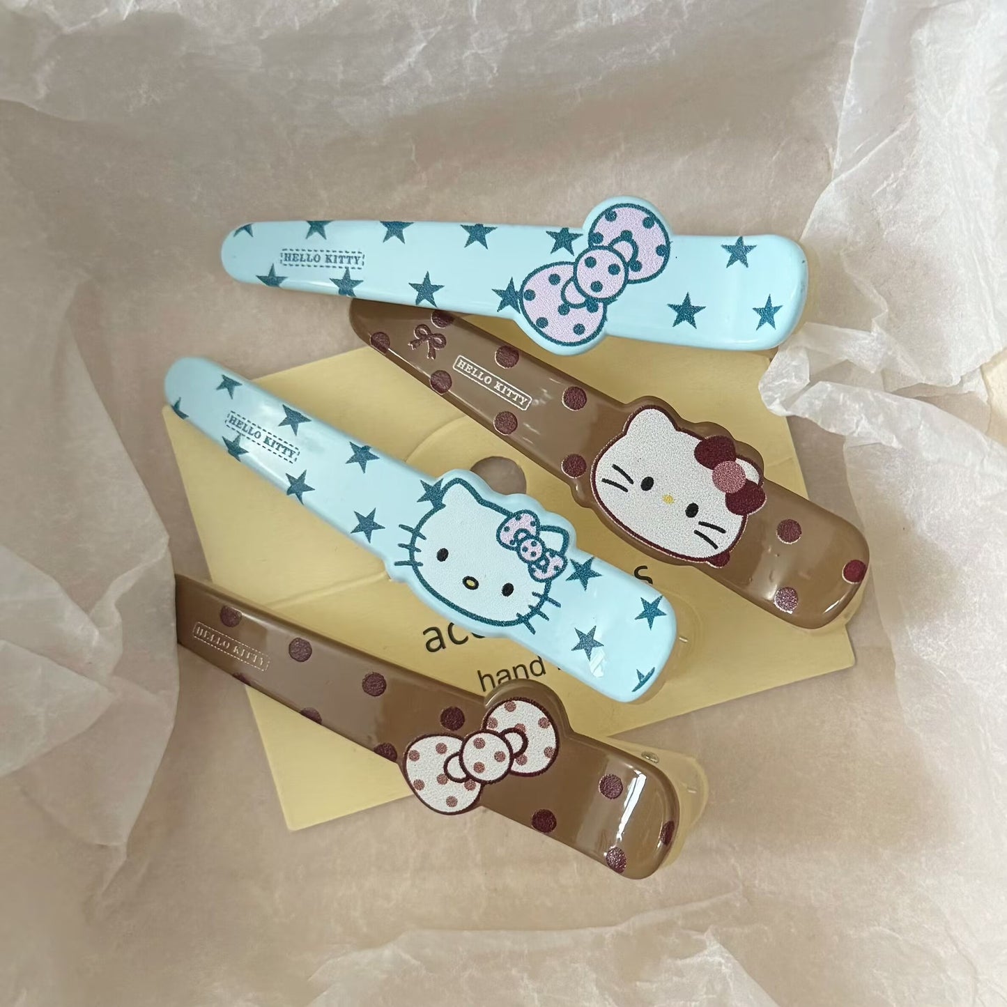棕色貓咪領結髮夾－商品主圖｜https://igowo.tw/