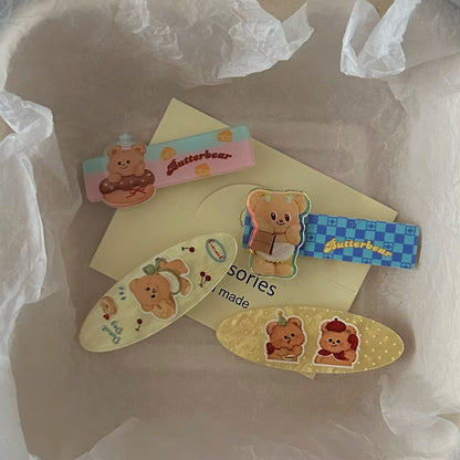 黃色壓克力小熊髮夾－商品主圖｜https://igowo.tw/