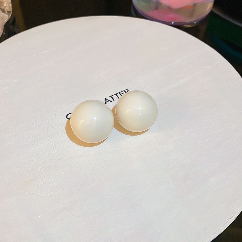 珍珠銀針花朵鑲鑽耳環－細節特寫48｜https://igowo.tw/