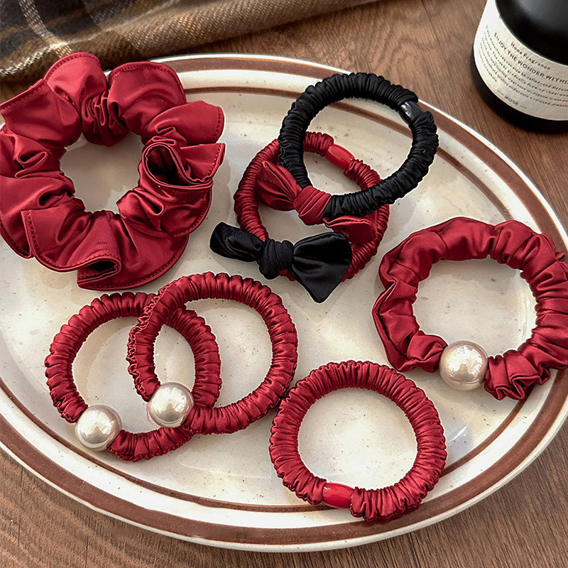 紅色珍珠蝴蝶結髮圈－珠珠紅色髮圈款實拍｜https://igowo.tw/
