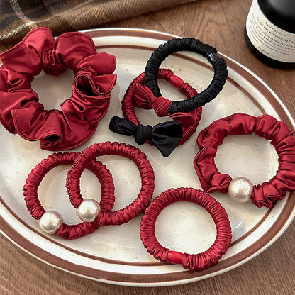 紅色珍珠蝴蝶結髮圈－珠珠紅色髮圈款實拍｜https://igowo.tw/