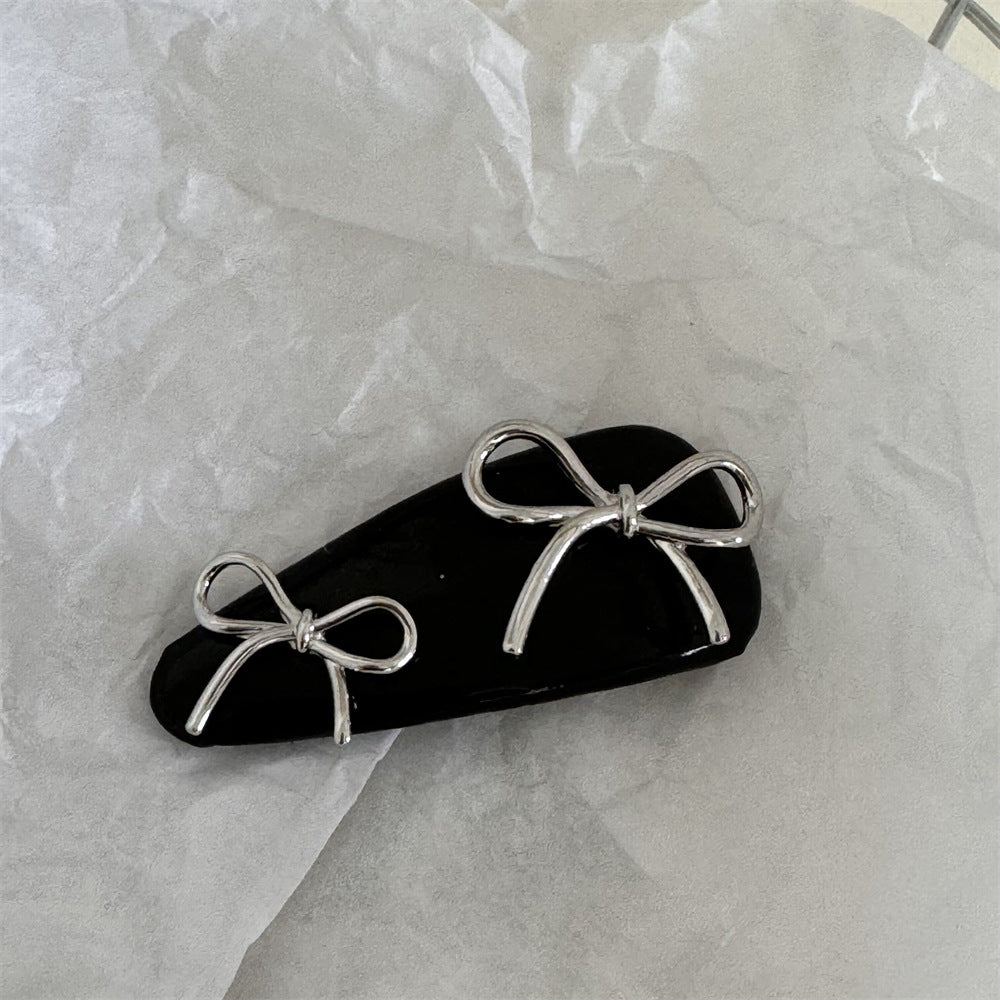皮革金屬蝴蝶結髮夾