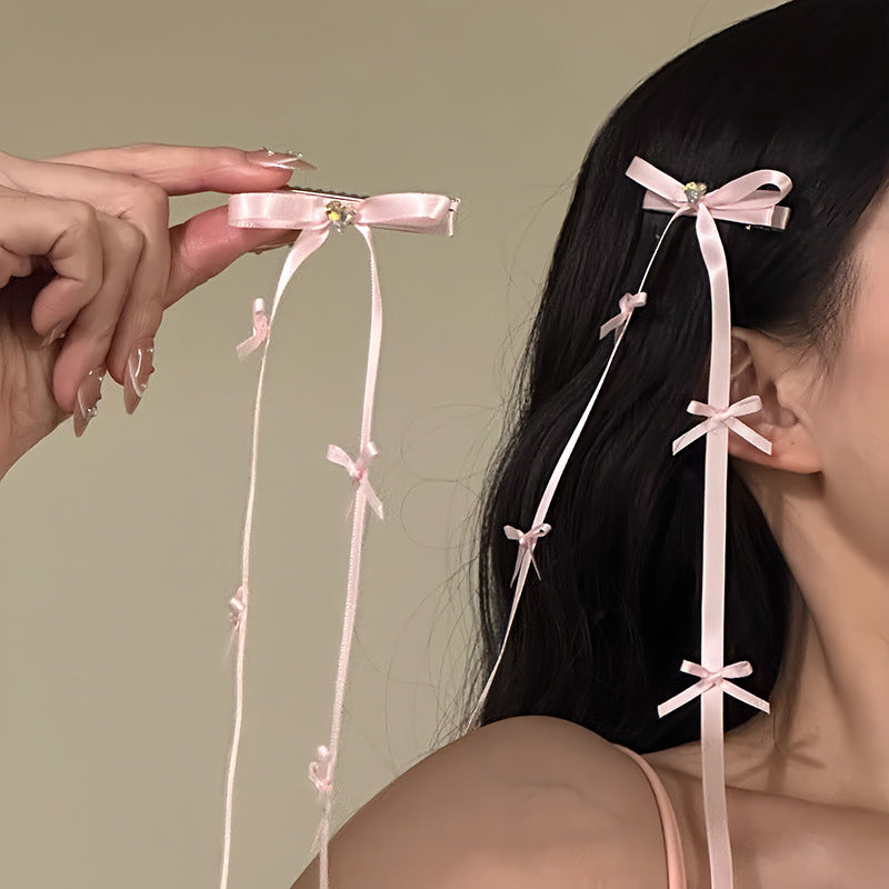 粉色緞帶蝴蝶結髮夾－商品主圖｜https://igowo.tw/