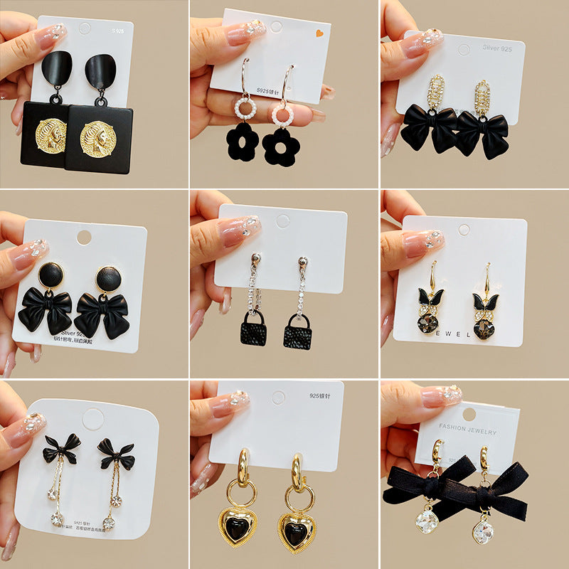 銀針蝴蝶結鑲鑽耳釘－商品主圖｜https://igowo.tw/