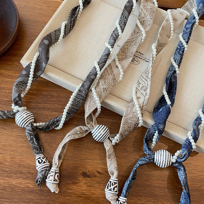 珍珠纏繞長版項鍊－深灰款實拍｜https://igowo.tw/