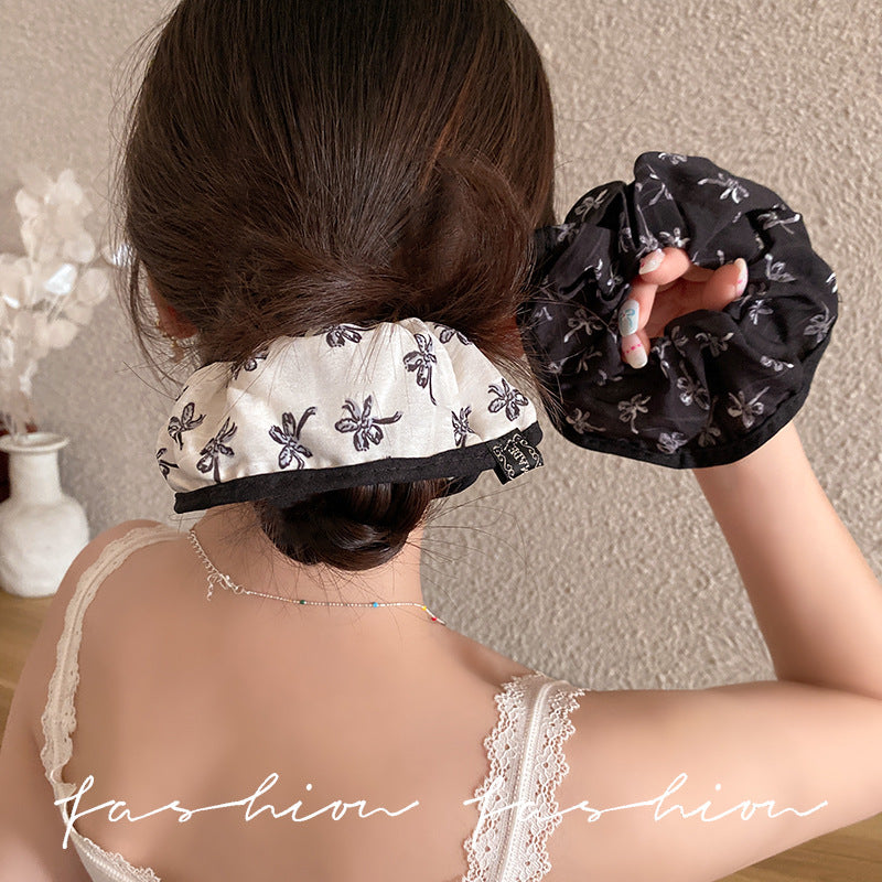 布面波點蝴蝶結髮圈－商品主圖｜https://igowo.tw/