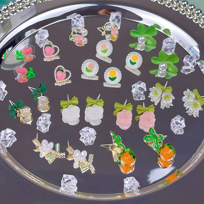 綠色金屬蝴蝶結耳釘－細節特寫2｜https://igowo.tw/