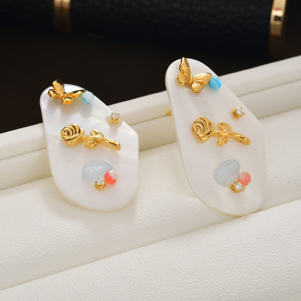 貝殼蝴蝶耳環－商品主圖｜https://igowo.tw/
