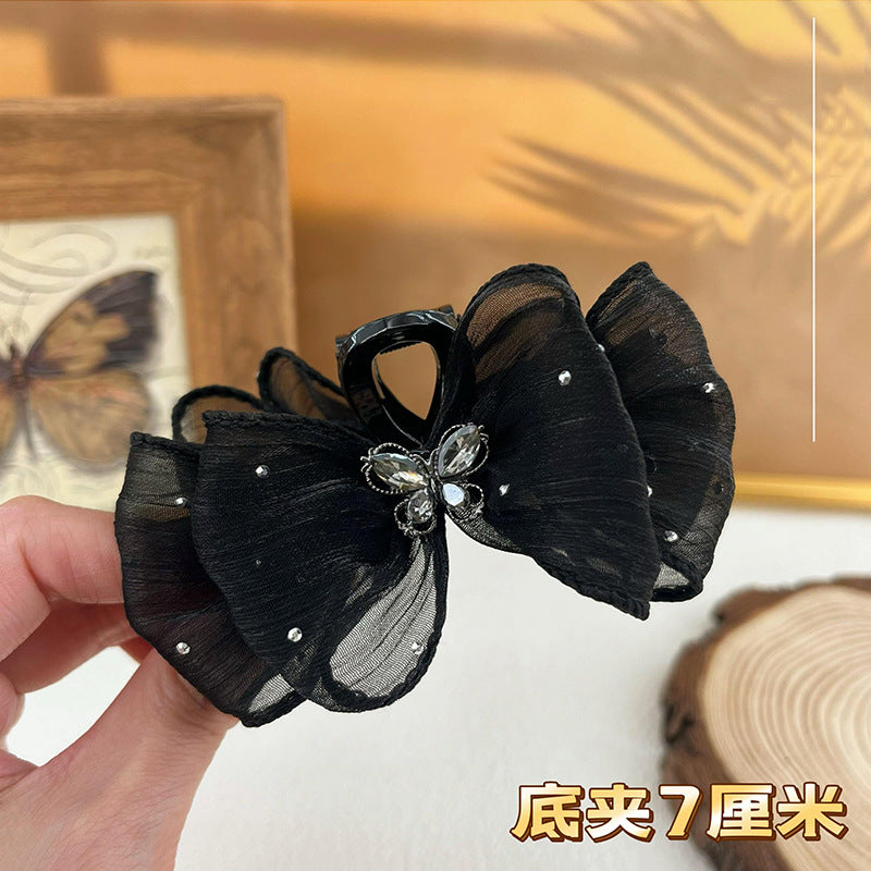 黑色蝴蝶結鯊魚夾