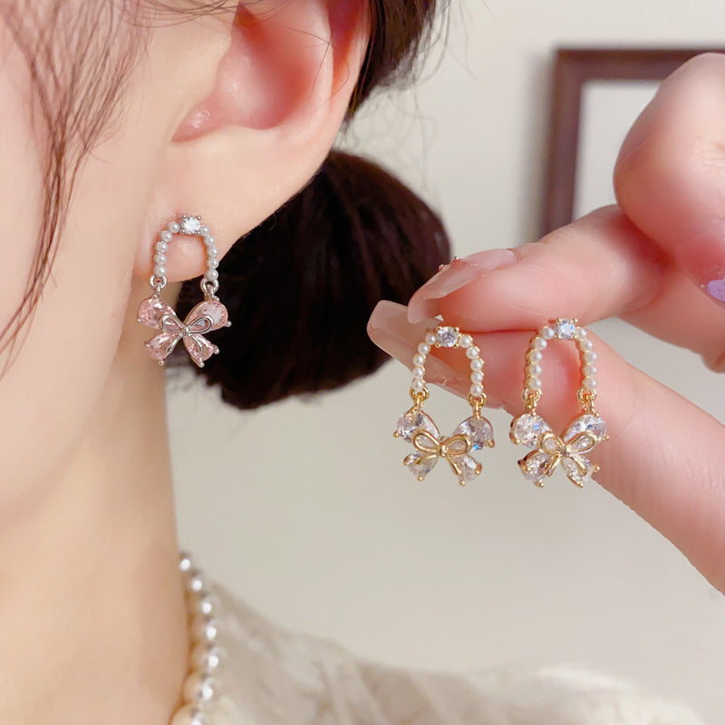 S925珍珠蝴蝶簡約耳環－商品主圖｜https://igowo.tw/