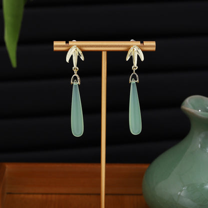 銀針樹葉水滴流蘇耳環－商品主圖｜https://igowo.tw/