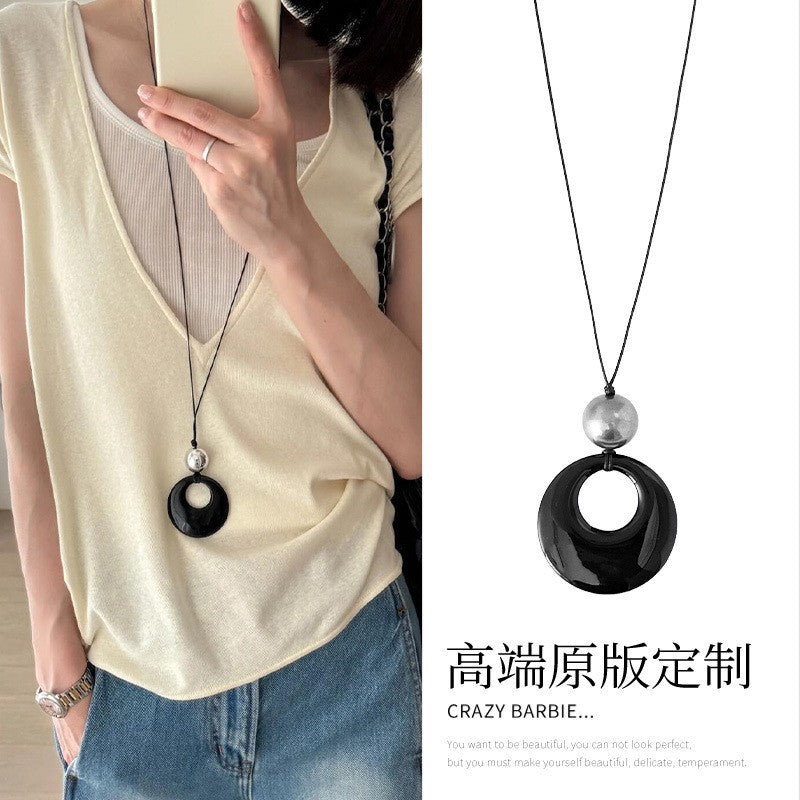 圓圈復古簡約項鍊－9#項鍊-黑色-綠色-皮繩-扁圓款細節｜https://igowo.tw/