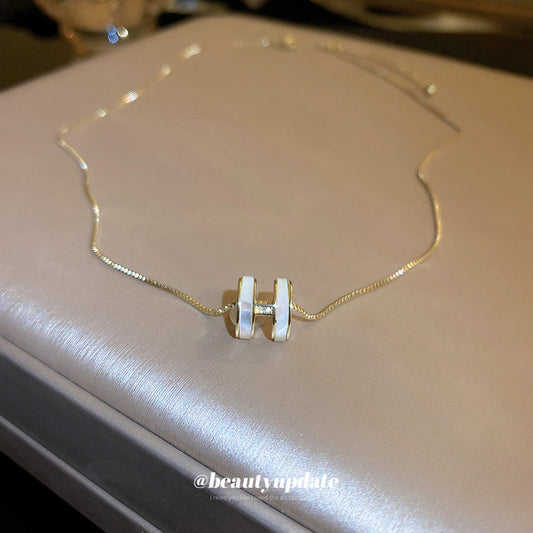 金色鋯石貝殼電鍍項鍊－商品主圖｜https://igowo.tw/