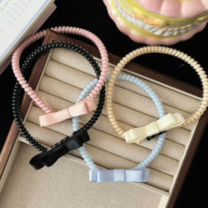 布面蝴蝶結髮圈－商品主圖｜https://igowo.tw/