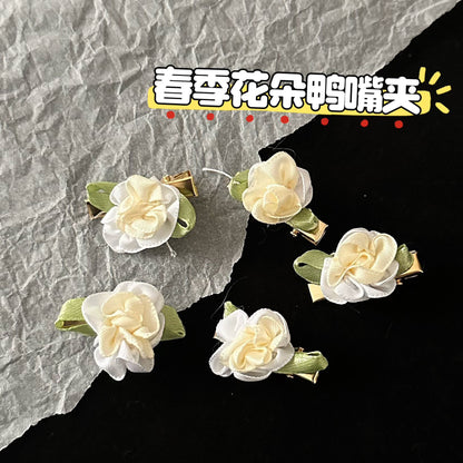 白色花朵簡約髮夾－商品主圖｜https://igowo.tw/