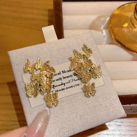 金色蝴蝶流蘇復古耳釘－商品主圖｜https://igowo.tw/