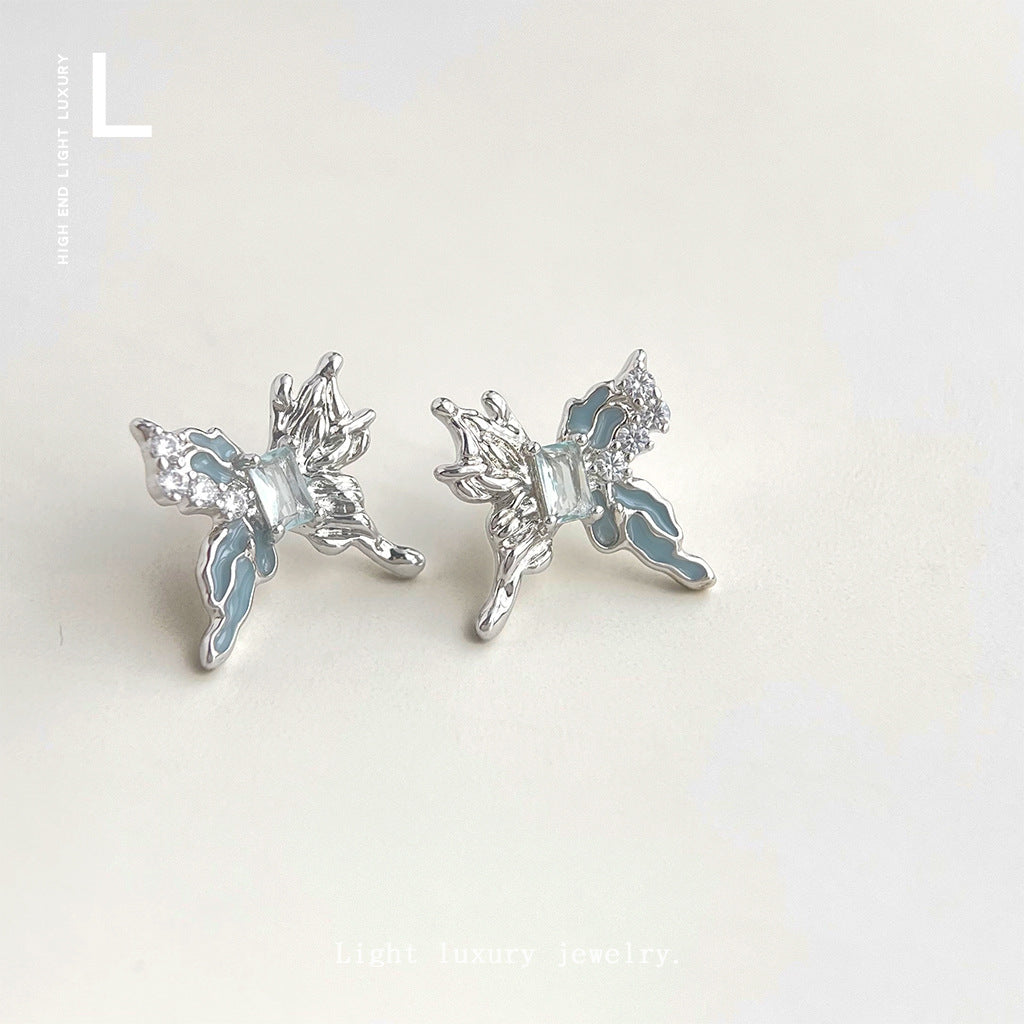 藍色鋯石蝴蝶耳釘－商品主圖｜https://igowo.tw/