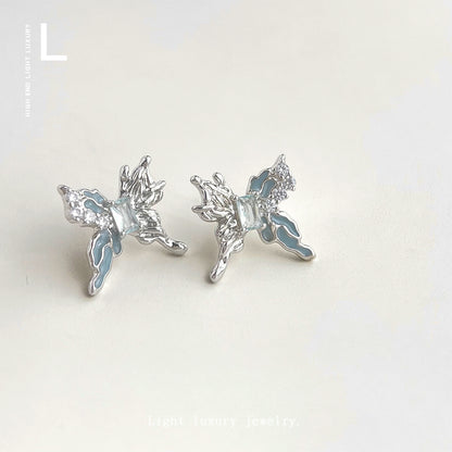 藍色鋯石蝴蝶耳釘－商品主圖｜https://igowo.tw/