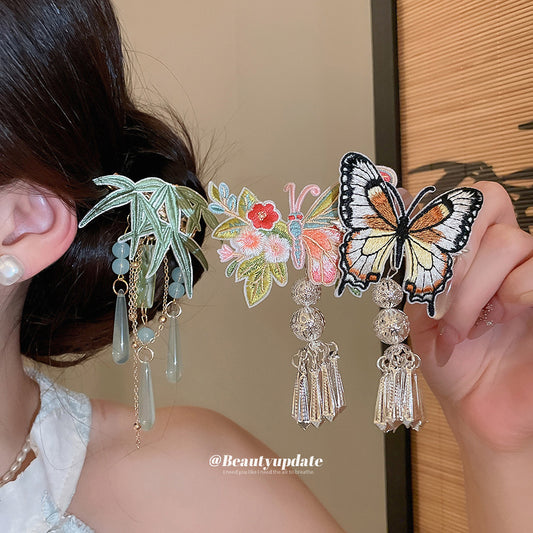 蝴蝶鈴鐺流蘇刺繡髮夾－商品主圖｜https://igowo.tw/