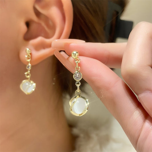 貓眼石星星流蘇耳環－商品主圖｜https://igowo.tw/
