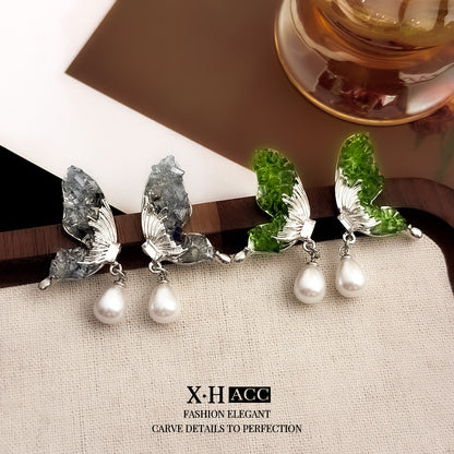 水晶珍珠蝴蝶耳釘－銀針-藍色款實拍｜https://igowo.tw/