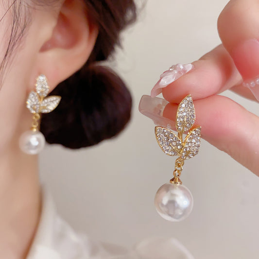珍珠鋯石樹葉耳墜－商品主圖｜https://igowo.tw/