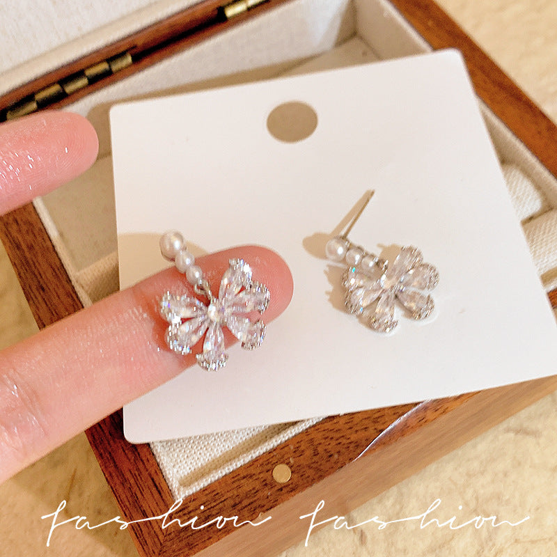 珍珠鋯石蝴蝶結耳環－商品主圖｜https://igowo.tw/