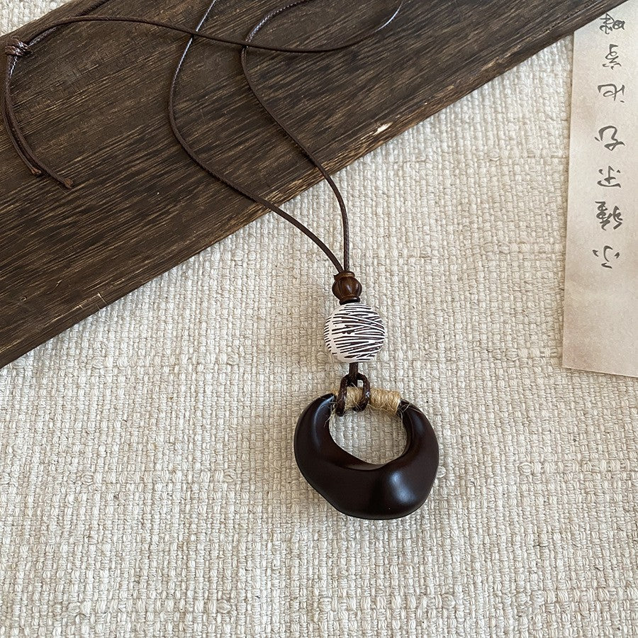 樹葉水滴墜飾復古項鍊－46#項鍊-咖色款細節｜https://igowo.tw/