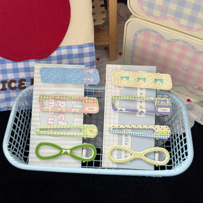 繽紛波點蝴蝶結髮夾－商品主圖｜https://igowo.tw/