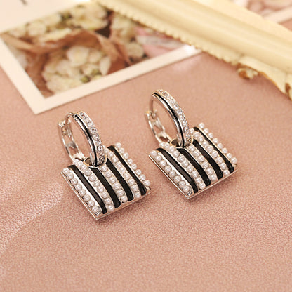 黑色串珠格紋耳環－商品主圖｜https://igowo.tw/
