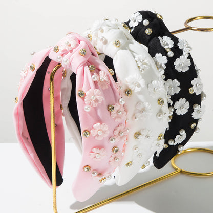 珍珠花朵扭結鑲鑽髮箍－商品主圖｜https://igowo.tw/