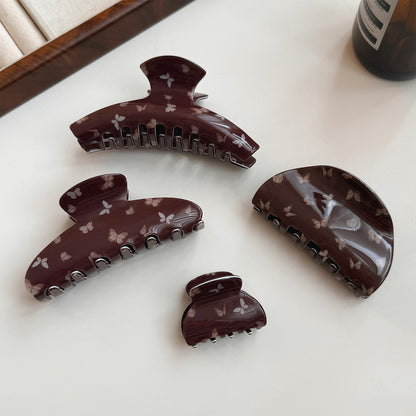 棕色蝴蝶簡約鯊魚夾－商品主圖｜https://igowo.tw/