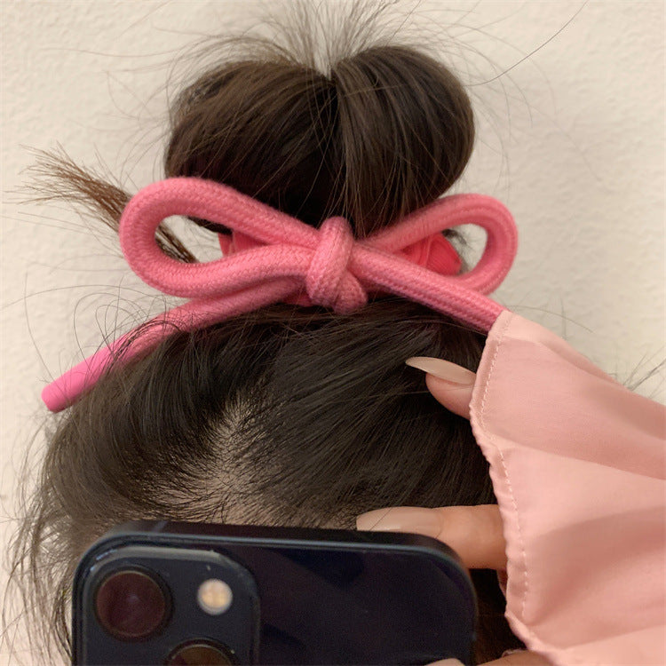 粉色蝴蝶結大腸圈髮圈－商品主圖｜https://igowo.tw/
