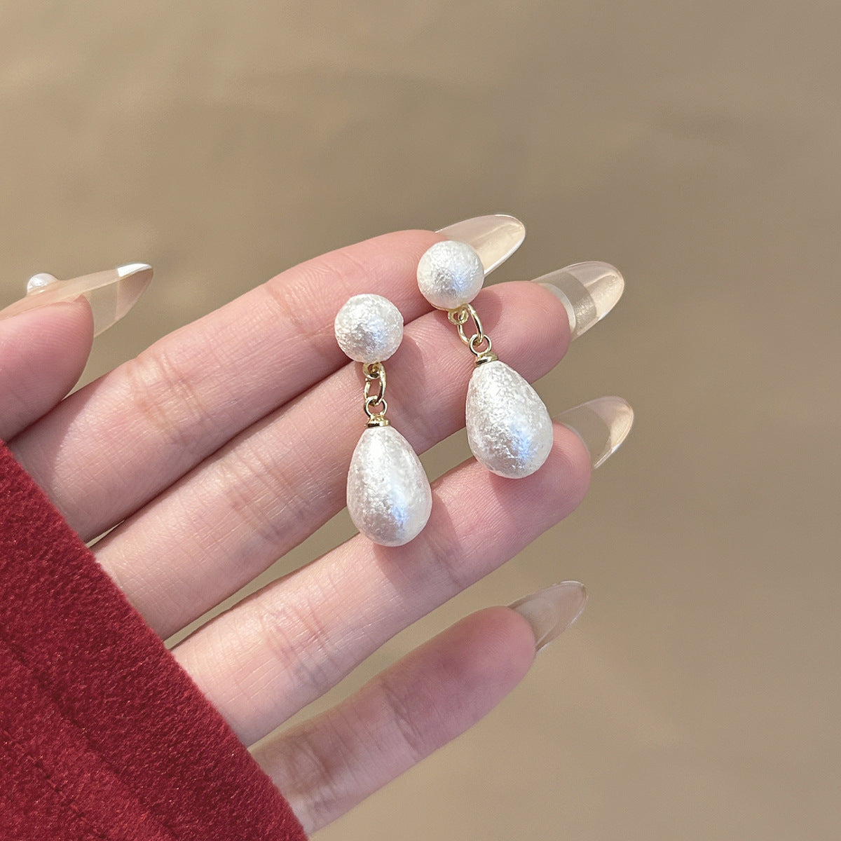 珍珠銀針水滴流蘇飾品－3/銀色雪花流蘇款實拍｜https://igowo.tw/