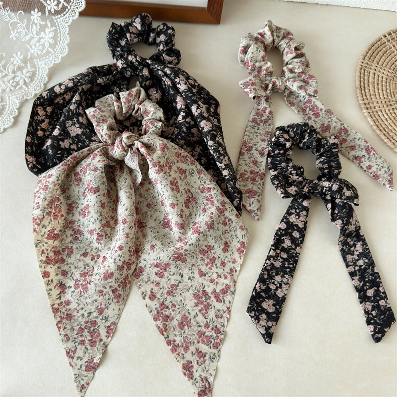 緞帶碎花蝴蝶結髮圈－商品主圖｜https://igowo.tw/