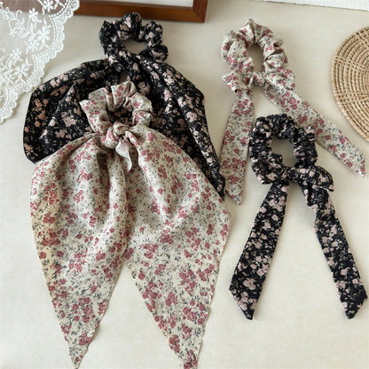緞帶碎花蝴蝶結髮圈－商品主圖｜https://igowo.tw/