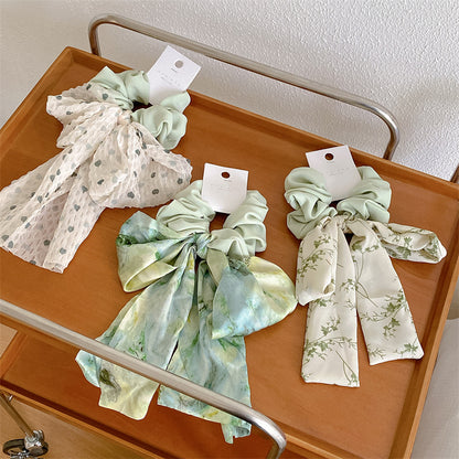 緞帶蝴蝶結碎花髮圈－商品主圖｜https://igowo.tw/