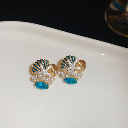 藍色銀針花朵鑲鑽耳釘－細節特寫13｜https://igowo.tw/