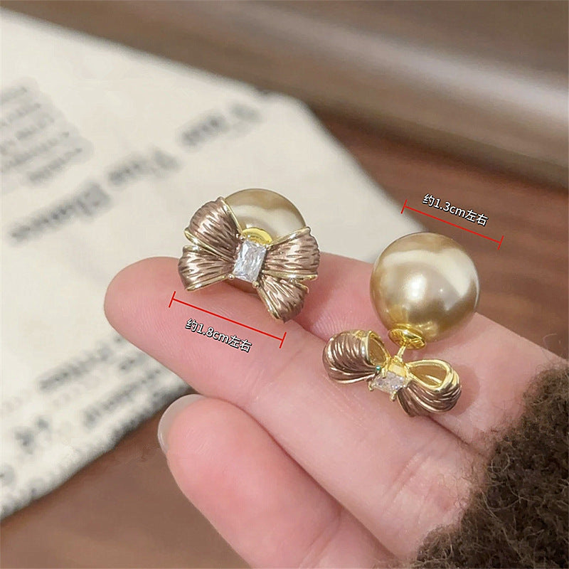 珍珠蝴蝶結耳釘－商品主圖｜https://igowo.tw/