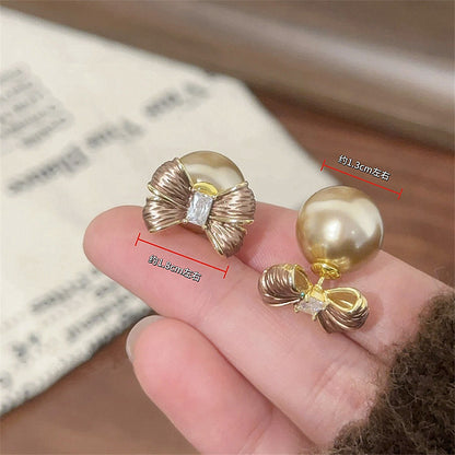 珍珠蝴蝶結耳釘－商品主圖｜https://igowo.tw/