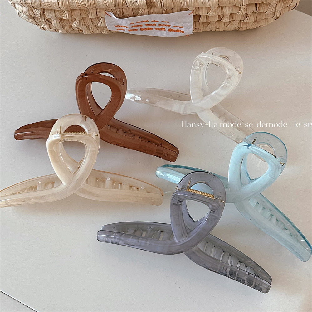 透明樹脂交叉鯊魚夾－商品主圖｜https://igowo.tw/
